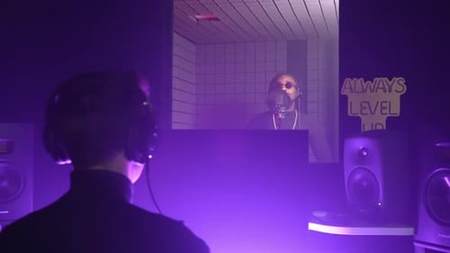 African American Singer Man is Singing New Song in Recording Studio Creating Album