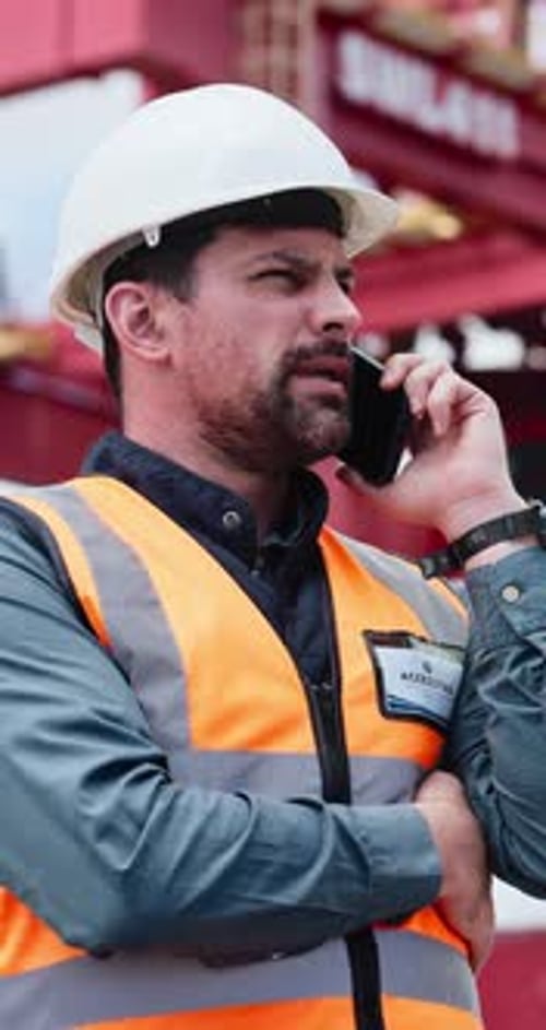 Construction, manager or man with phone call for negotiation, building material or progress info