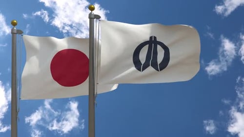 Waving Flags of Japan and Kagoshima Prefecture on Flagpoles