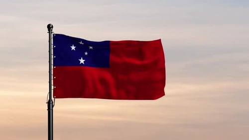 Die Flagge von Samoa weht unter hellem Himmel
