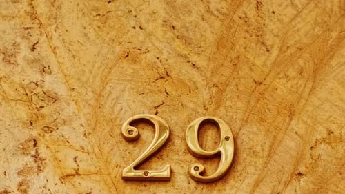 Number 29 (twenty-nine) Affixed to a Building