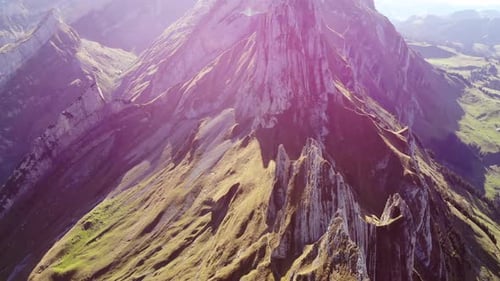 Aerial flyover over Schaefler ridge in Appenzell, Switzerland towards Altenalptürm