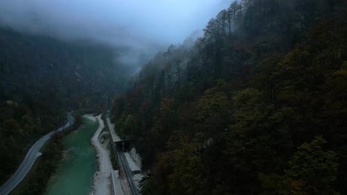 Bled Lake, misty mountains, woodland valley, Slovenian infrastructure