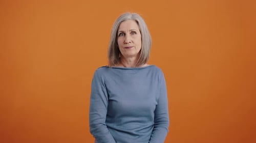 Serious Woman Says No and Shakes Head Disapprovingly