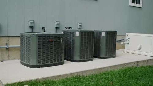 Air Conditioning Units Sit Outside Suburban Home