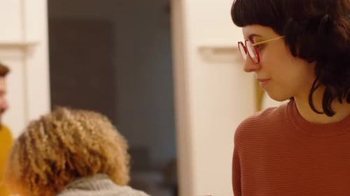 Friends Enjoying a Meal Together Indoors