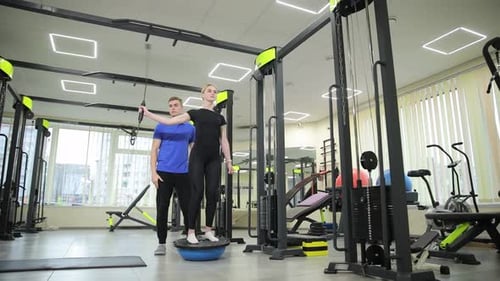 A Patient Uses Physical Therapy to Recover From a Sports Injury The Doctor Works with Individual