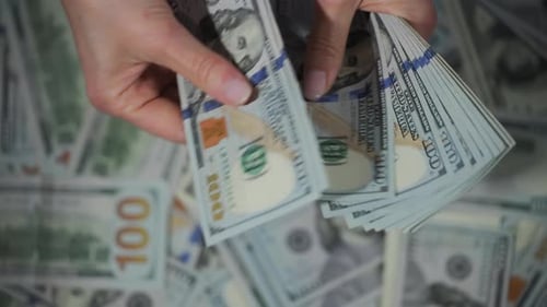 Male Hands Counting Money Holding Hundred Dollar Bills Close Up