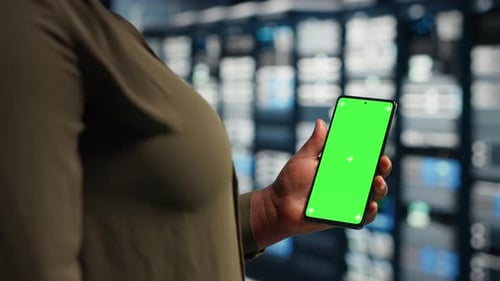 Data Center Employee Reviews Power Management Using Green Screen Smartphone
