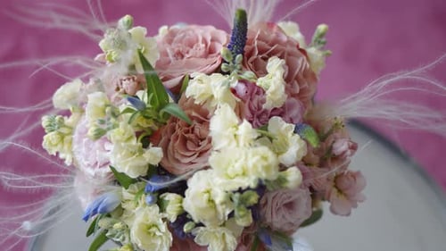 Elegant Wedding Bouquet of Pink and Cream Flowers