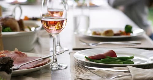 Festive Family Meal with Wine and Roasted Chicken