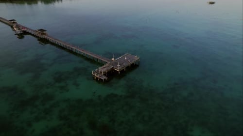 An Overhead Perspective Of A Wooden Pier