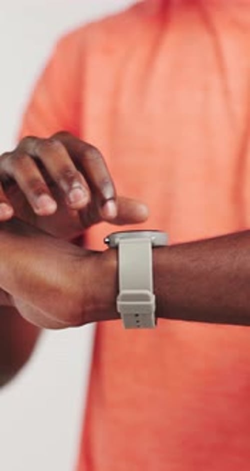 Man, hands or smart watch in studio for exercise, tracking heart rate or fitness progress app