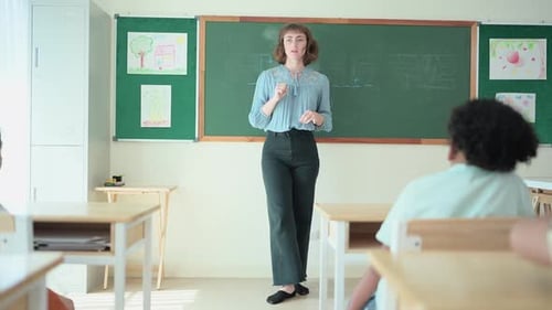 Teacher and students, Learn and study in a classroom of school where youngsters sit and listen