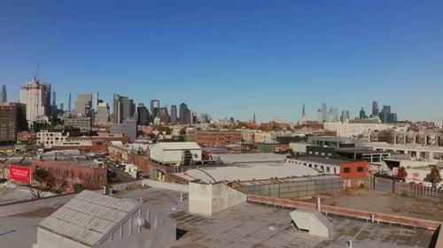 Aerial View of Cars Maneuvering Through a Four Way Intersection in New York City Bustling Urban