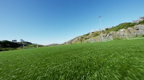 Drone Flight Over Turf Grass Of A Football Field
