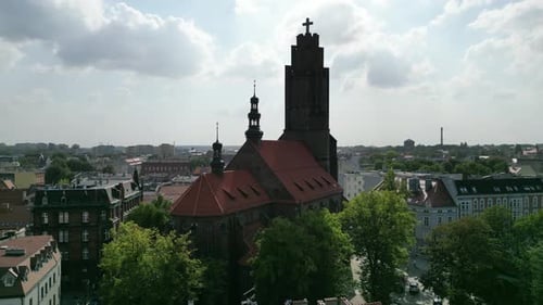 Medieval church during a beautiful summer day surrounded by lush greenery