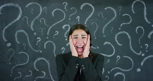 Portrait of a beautiful business girl (student) in a panic of choice of the future, in the backgro