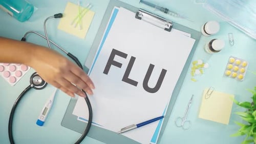 Medical Supplies with Flu Diagnosis on Table