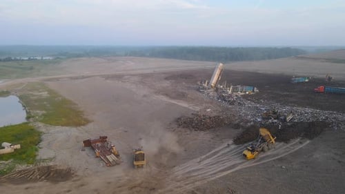 Aerial View of a Large Landfill Site with Waste Disposal and in Operation