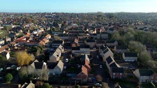Aerial view of houses and streets, United Kingdom.