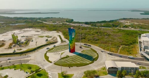 Color monument in urban roundabout. Window of the world. Barranquilla, Colombia. Aerial shot.