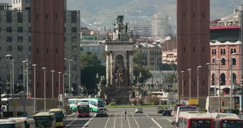 Placa d'Espanya Between Torres Venecianes With Traffic At Avinguda de la Reina Maria Cristina In Bar