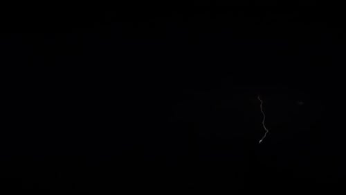 Dramatic Lightning Flashes Across a Thunderstorm-Ridden Sky