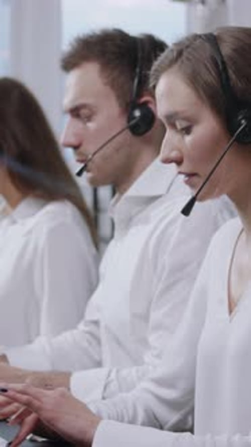 Dedicated Call Center Professionals Collaborating Effectively with Headsets for Enhanced Service