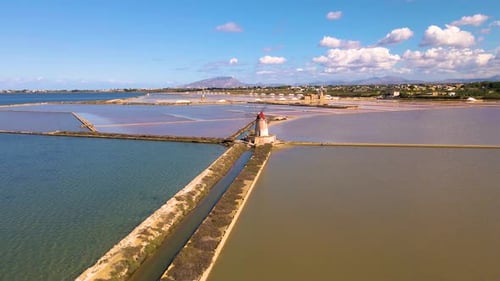 Discover the Stunning Salt Pans of Sicily Under a Vibrant Blue Sky