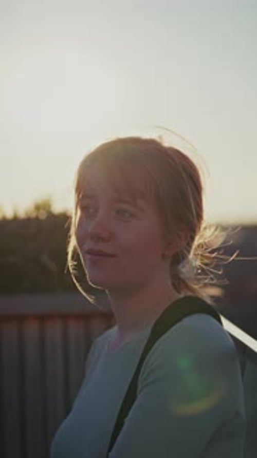 Woman Smiling in the Sunset