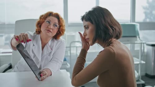 Medic Showing Tablet Tests Result Explaining Diagnosis to Patient Clinic Closeup