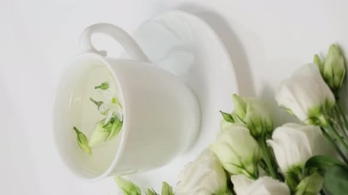 Elegant White Tea Cup with Flowers