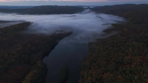 autumn fall nature mountains landscape misty foggy scenic view above the clouds at sunrise