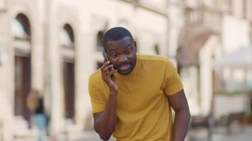 Funny African American Attractive Man Speak on Phone Stand on Street Smile Sunlight Sunset Cellphone