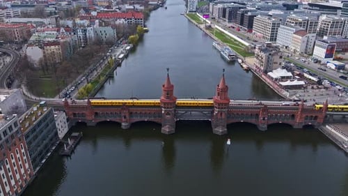 Aerial view of train crossing The Oberbaum Bridge , Berlin , Germany