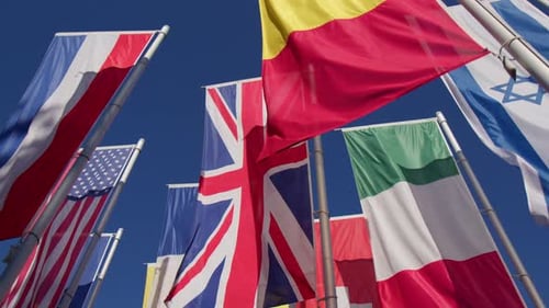 Collection of Colorful International Flags Waving in Wind