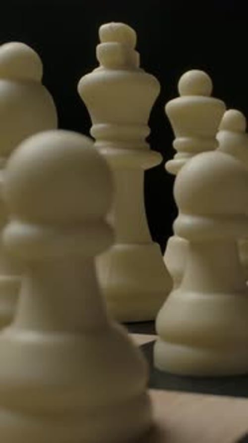 White Chess Pieces on Chessboard Close Up Footage