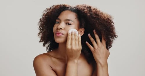 Studio, woman and sponge for makeup, glow and foundation for skin with cosmetics, routine and face