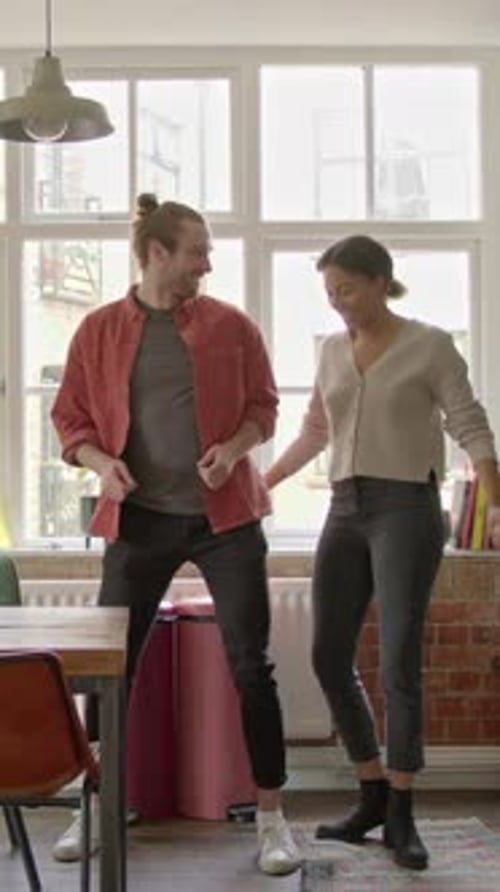 Happy Couple Dancing in Living Room, Having Fun