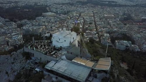 Cityscape Aerial View with Church on Hill