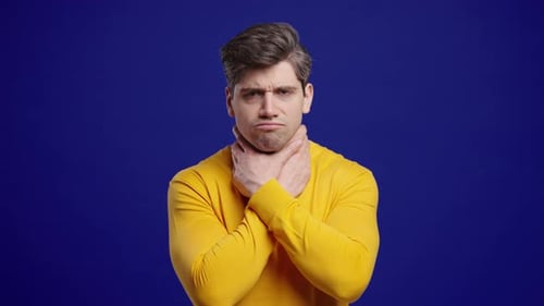 Mature Man Has Sore Sick Guy With Swollen Throat On Blue Studio Angina Pain