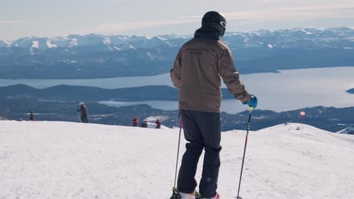 Ski Instructor Skiing Down Mountain