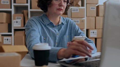 E Commerce, Product Packaging Worker Slowly Working On A Laptop In An E Commerce Room In Slow