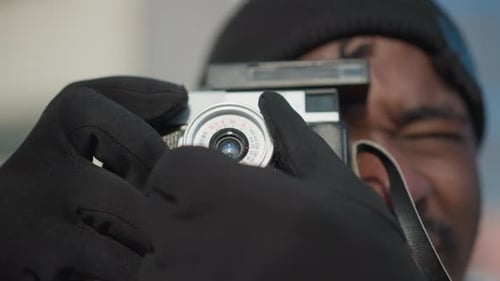 Man Using Vintage Camera, Focusing Lens