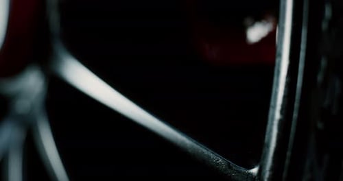 Close up of wheels details of anonymous prestigious modern car. Shot in 8K. Concept of passion for