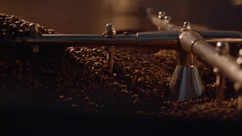 Coffee Beans Being Roasted in Industrial Machine