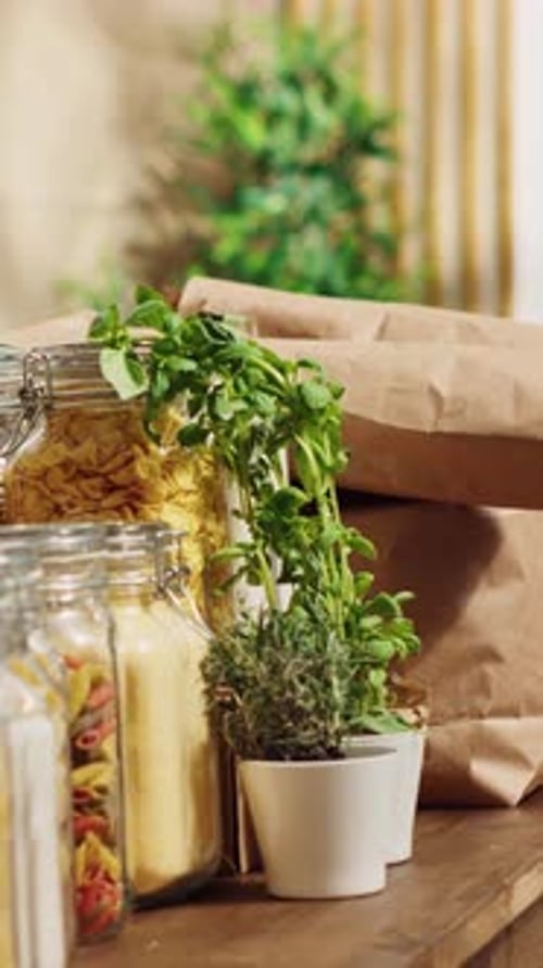 Jars of Pasta with Kraft Bags and Herbs
