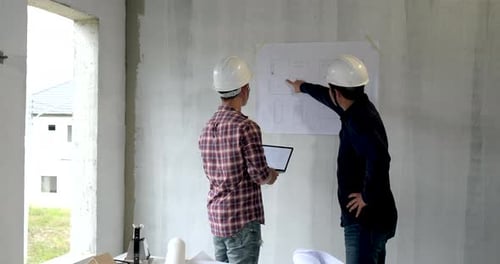 Group of young asian of building architect construction engineer have meeting