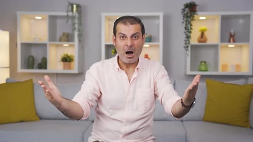 Man getting angry at camera.